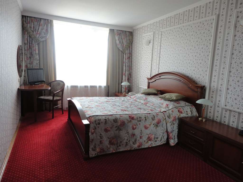 Planeta Hotel Minsk Quarto foto